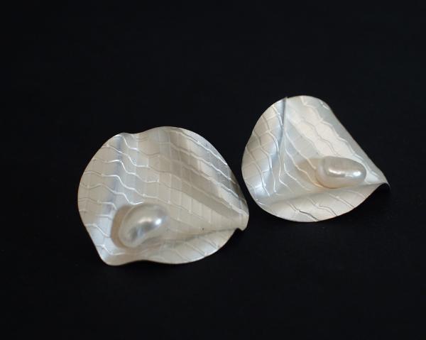 Brincos com pérolas